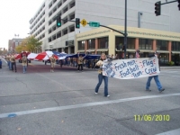 Giant flag carried by Kuna football, Veterans Day Parade.JPG