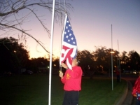 Sep19th,2009_Our Cmdt. Erickson putting up flags.JPG