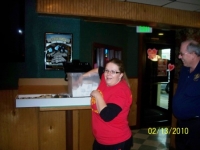 Feb13, 2010 Winning ticket being drawn by employee of Quinn's restaurant.JPG